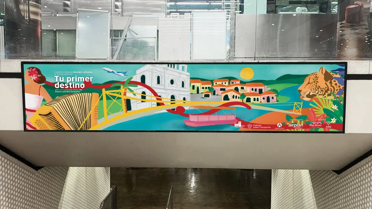Gráfica panorámica de la identidad de Airplan sobre una puerta de embarque